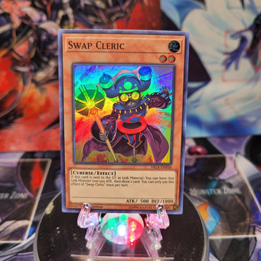 A Super Rare "Swap Cleric" card from the Yugioh Set: Fists of the Gadgets.