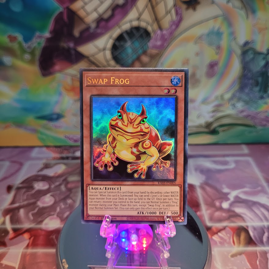 An Ultra Rare "Swap Frog" card from the Yugioh Set: Quarter Century Bonanza (RA03).