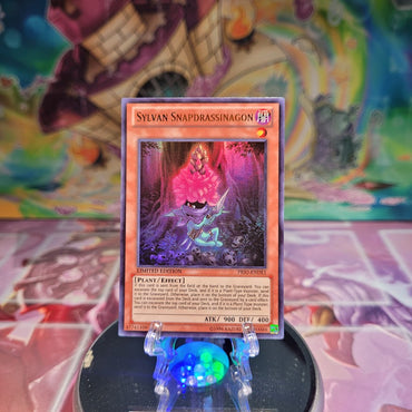 An Ultra Rare "Sylvan Snapdrassinagon" card from the Yugioh Set: Primal Origin.