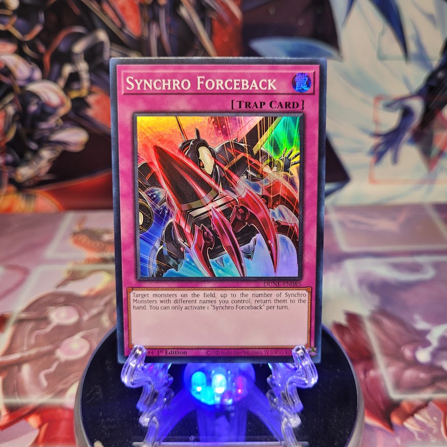 A Super Rare "Synchro Forceback" card from the Yugioh Set: Duelist Nexus. 