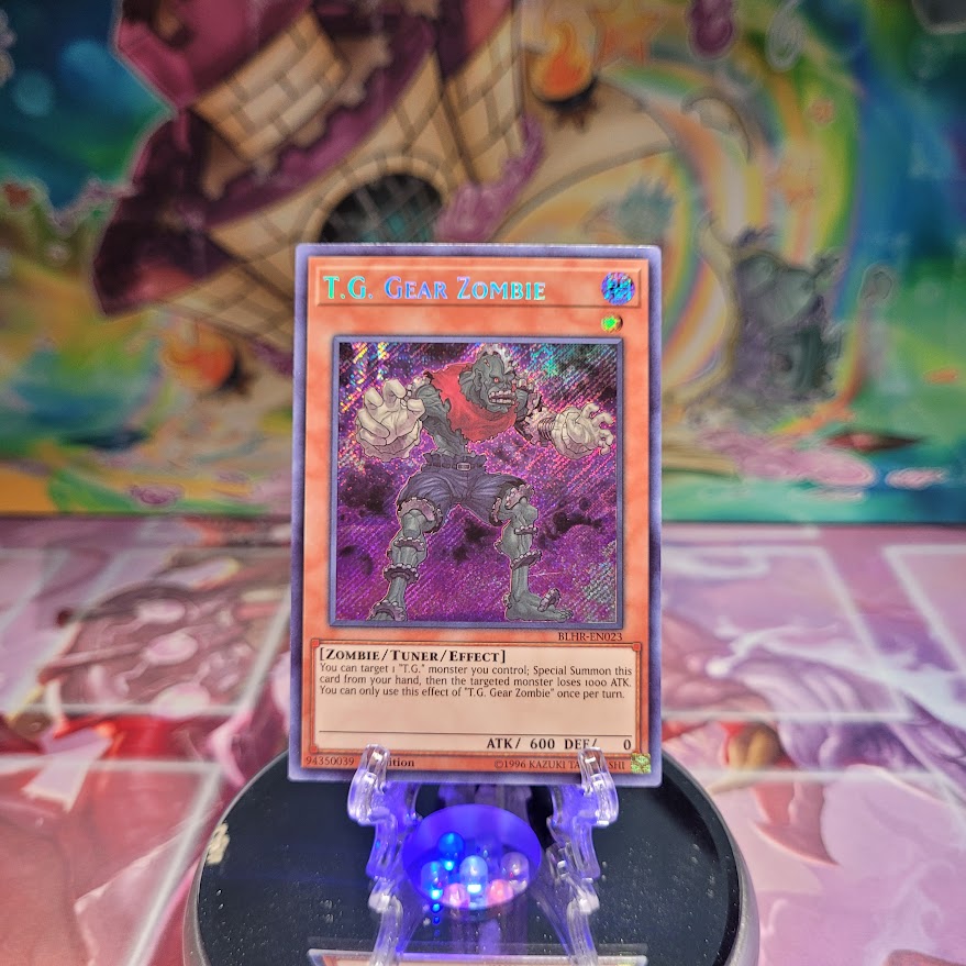 A Secret Rare "T.G. Gear Zombie" card from the Yugioh Set: Battles of Legend: Hero's Revenge.