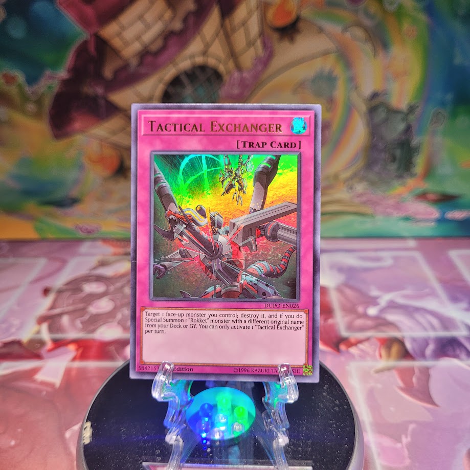 An Ultra Rare "Tactical Exchanger" card from the Yugioh Set: Duel Power.