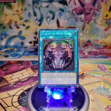 A Prismatic Secret Rare "Tales of the White Forest card from the Yugioh 2025 Mega-Tin Mega Pack set (MP25).