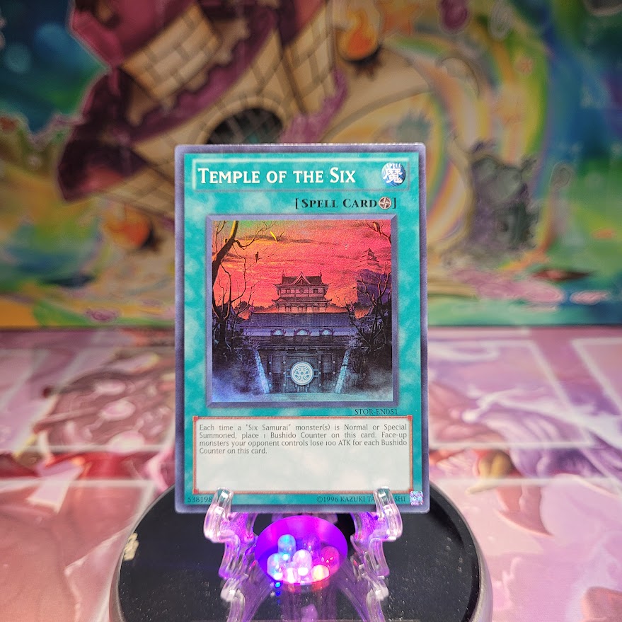 A Super Rare "Temple of the Six" card from the Yugioh Set: Storm of Ragnarok.