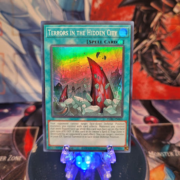 A Super Rare "Terrors in the Hidden City" card from the Yugioh Set: Darkwing Blast.