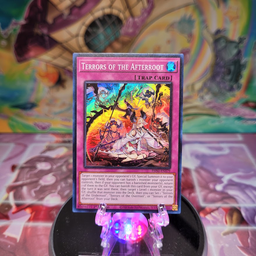 A Super Rare "Terrors of the Afterroot" card from the Yugioh Set: Phantom Nightmare.