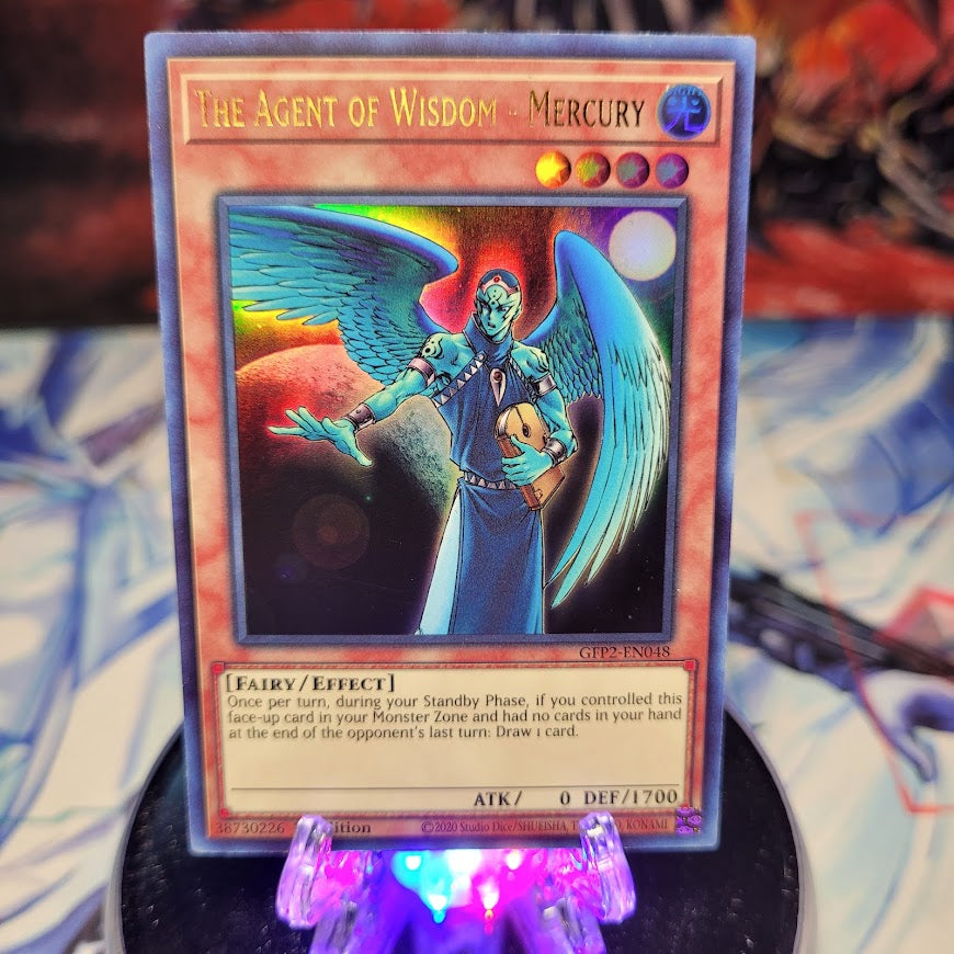  An Ultra Rare "The Agent of Wisdom - Mercury" card from the Yugioh Set: Ghosts From the Past: The 2nd Haunting (GFP2).