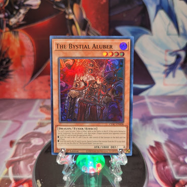 A Super Rare "The Bystial Aluber" card from the Yugioh Set: Cyberstorm Access.