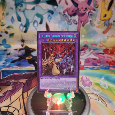 A Secret Rare “The Chaotic Phantasmal Sacred Beasts” card from the Yugioh Set: Chaos Origins (CORI).