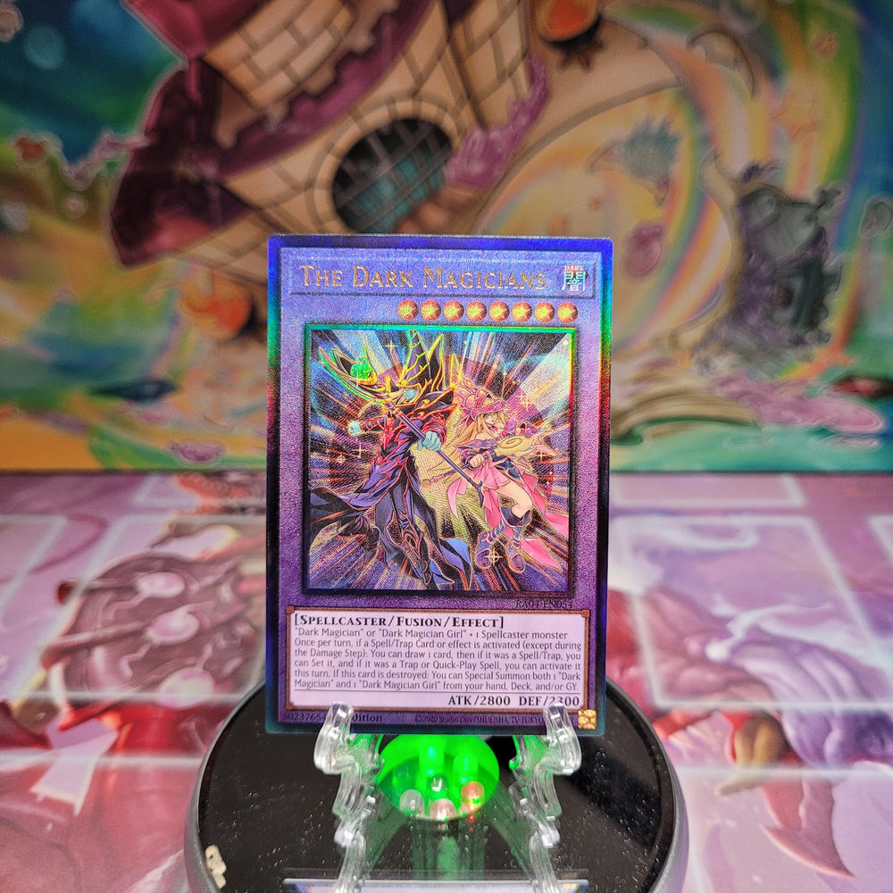 A Prismatic Ultimate Rare "The Dark Magicians" card from the Yugioh Set: Quarter Century Stampede (RA04).