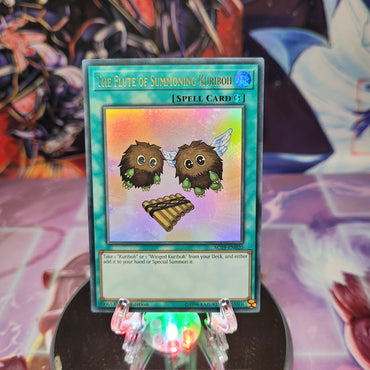 An Ultra Rare "The Flute of Summoning Kuriboh" card from the Yugioh Set: Advent Calendar 2019 (AC19).