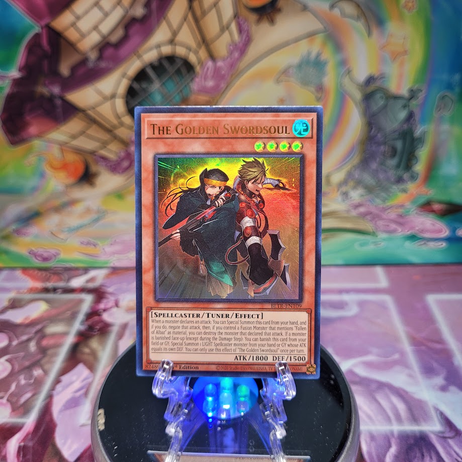 An Ultra Rare "The Golden Swordsoul" card from the Yugioh Set: Battles of Legend: Terminal Revenge.