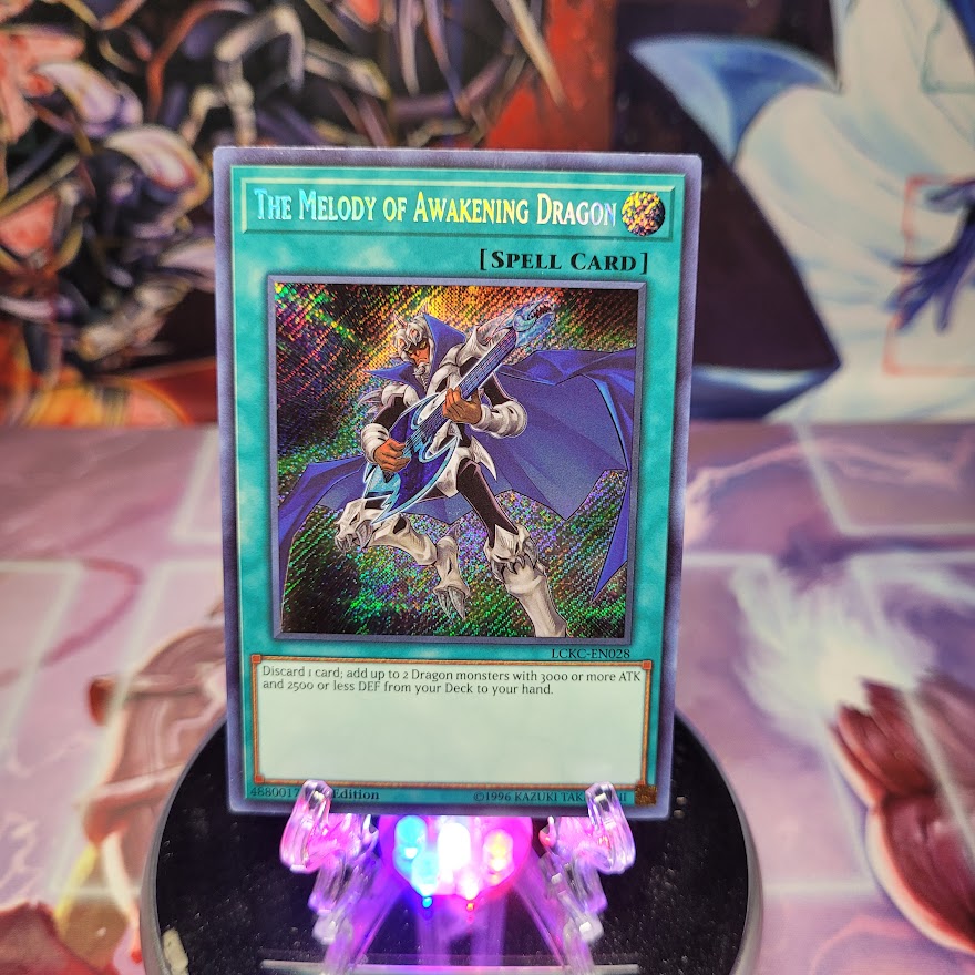 A Secret Rare "The Melody of Awakening Dragon" card from the Yugioh Set: Legendary Collection: Kaiba.