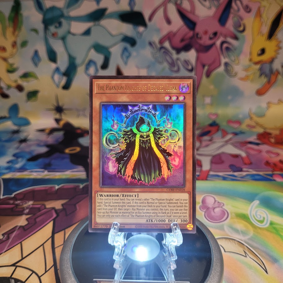 An Ultra Rare “The Phantom Knights of Decayed Cloak” card from the Yugioh Set: Chaos Origins (CORI).