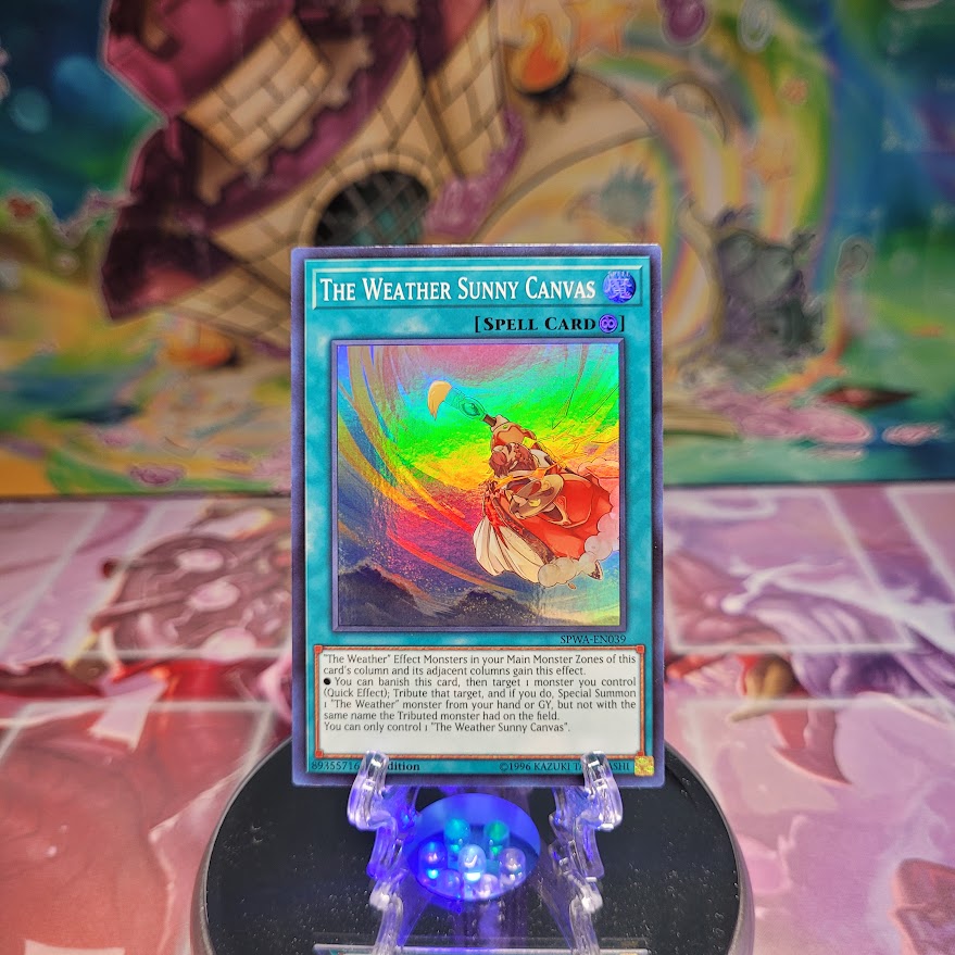 A Super Rare "The Weather Sunny Canvas" card from the Yugioh Set: Spirit Warriors.