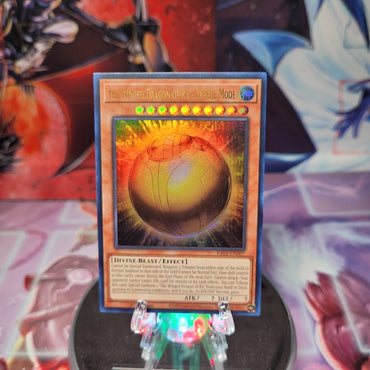 An Ultra Rare "The Winged Dragon of Ra - Sphere Mode" card from the Yugioh Set: Rarity Collection 1 (RA01).