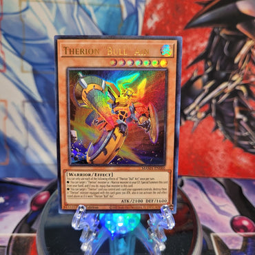 An Ultra Rare "Therion "Bull" Ain" card from the Yugioh Set: Magnificent Mavens.