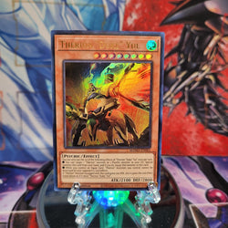 An Ultra Rare "Therion "Duke" Ain" card from the Yugioh Set: Magnificent Mavens.