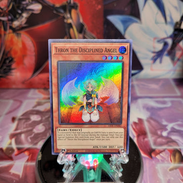  A Super Rare "Thron the Disciplined Angel" card from the Yugioh Set: Lightning Overdrive.