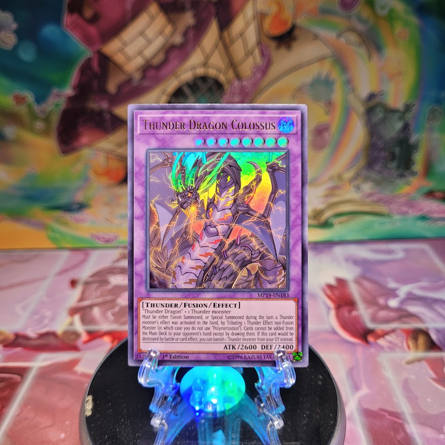 An Ultra Rare "Thunder Dragon Colossus" card from the Yugioh 2019 Gold Sarcophagus Tins: Mega Pack.