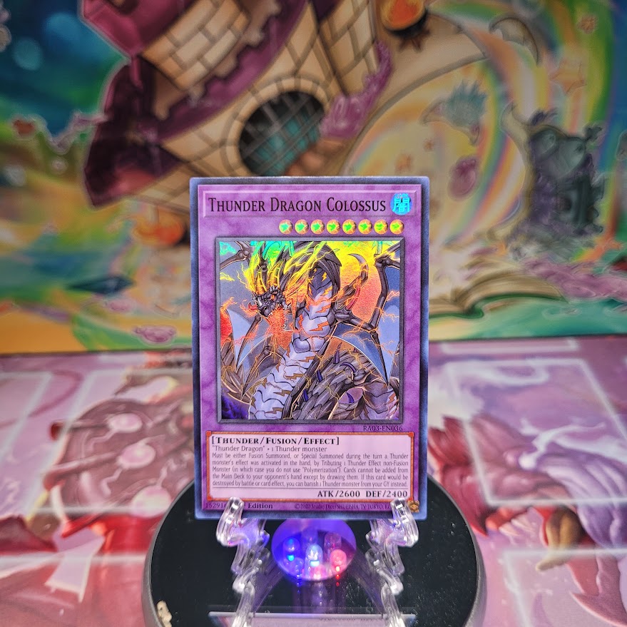 A Super Rare "Thunder Dragon Colossus" card from the Yugioh Set: Quarter Century Bonanza (RA03).