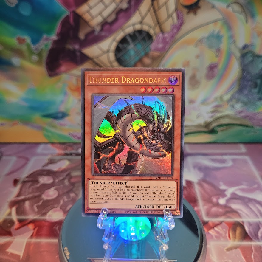 An Ultra Rare "Thunder Dragondark" card from the Yugioh Set: Quarter Century Bonanza (RA03).