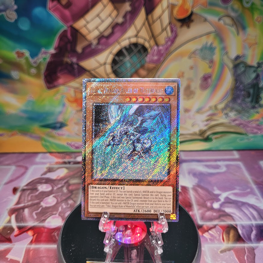 A Platinum Secret Rare "Tidal, Dragon Ruler of Waterfalls" card from the Yugioh Set: Quarter Century Bonanza (RA03)