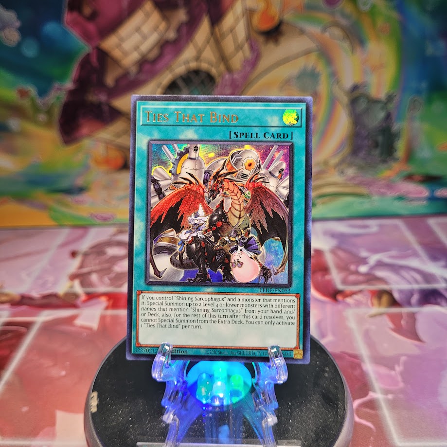  An Ultra Rare "Ties that Bind" card from the Yugioh Set: Legacy of Destruction.