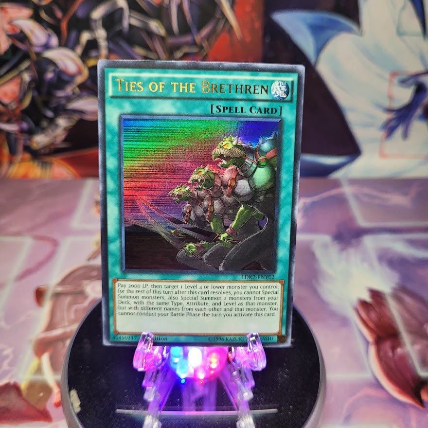 An Ultra Rare "Ties of the Brethren" card from the Yugioh Set: Legendary Decks 2.