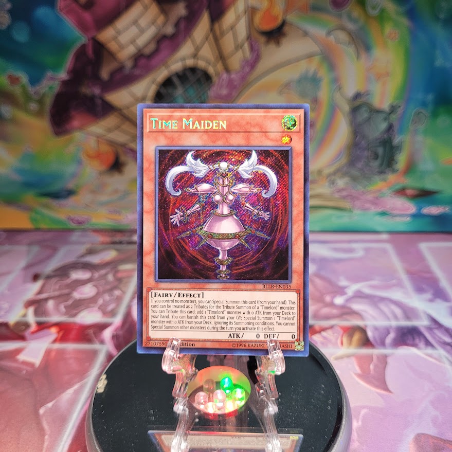 A Secret Rare "Time Maiden" card from the Yugioh Set: Battles of Legend: Relentless Revenge.