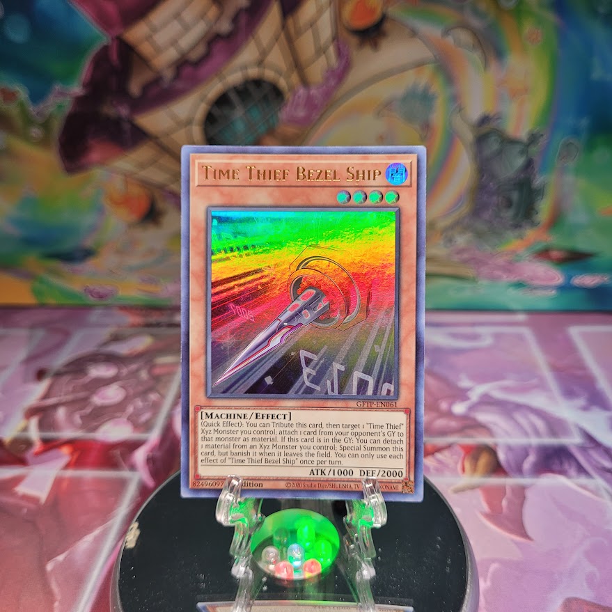 An Ultra Rare "Time Thief Bezel Ship" card from the Yugioh Set: Ghosts From the Past.