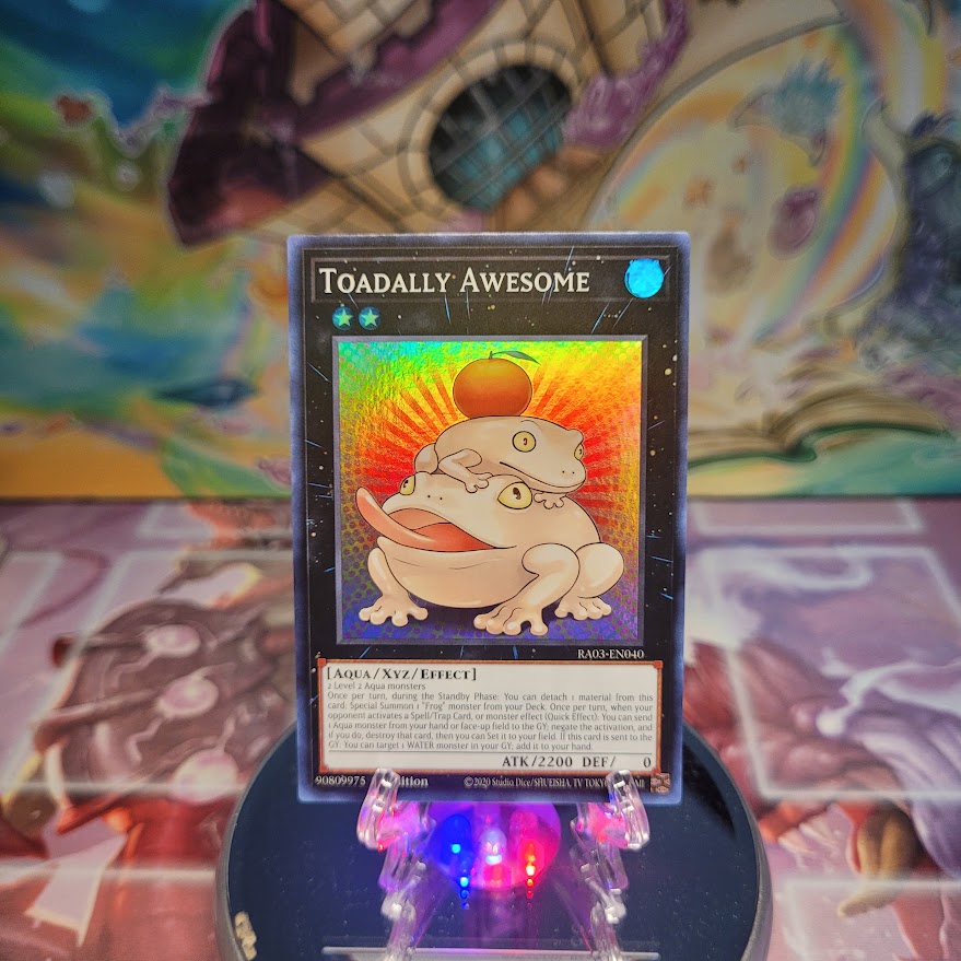 A Super Rare "Toadally Awesome" card from the Yugioh Set: Quarter Century Bonanza (RA03).