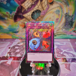 A Platinum Secret Rare "Token Stampede" card from the Yugioh Set: Quarter Century Stampede (RA04).