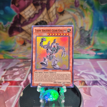 A Super Rare "Toon Ancient Gear Golem" card from the Yugioh Set: Dragons of Legend 2.