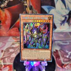 A Secret Rare "Toon Black Luster Soldier" card from the Yugioh Set: Battles of Legend: Crystal Revenge (BLCR).