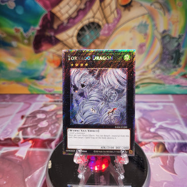 A Platinum Secret Rare "Tornado Dragon" card from the Yugioh Set: Quarter Century Stampede (RA04).