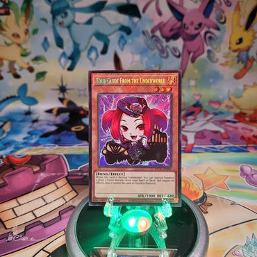 A Secret Rare Chibi Art "Tour Guide From the Underworld" card from the Yugioh Set: Battles of Legend: Glorious Gallery (BLGG).