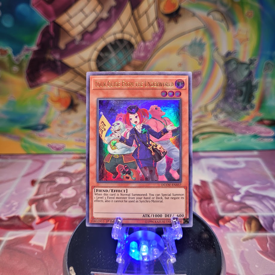 An Ultra Rare Alternate Art "Tour Guide From the Underworld" card from the Yugioh Set: Duel Overload.