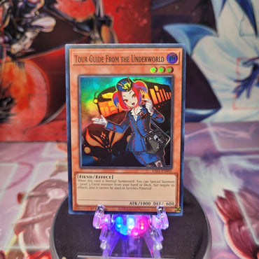 A Super Rare "Tour Guide From the Underworld" card from the Yugioh Set: Rarity Collection 1 (RA01).