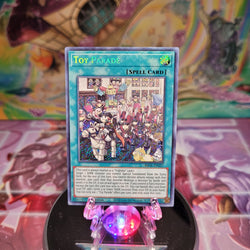  A Secret Rare "Toy Parade" card from the Yugioh Set: Brothers of Legend.