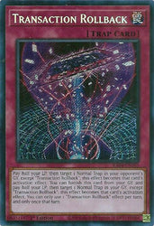 A Secret Rare "Transaction Rollback" card from the Yugioh Set: Quarter Century Stampede (RA04).
