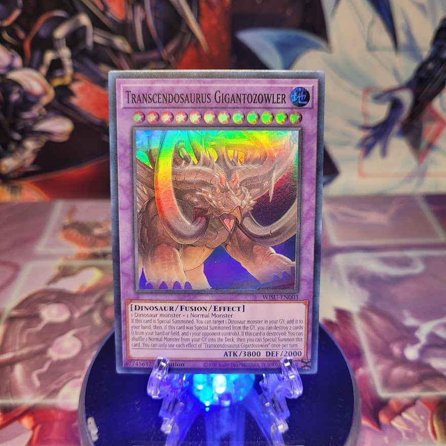 A Super Rare "Transcendosaurus Gigantozowler" card from the Yugioh Set: Wild Survivors.