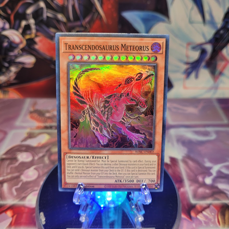 A Super Rare "Transcendosaurus Meteorus" card from the Yugioh Set: Wild Survivors.