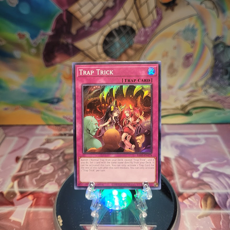 A Super Rare "Trap Trick" card from the Yugioh Set: Quarter Century Bonanza (RA03).