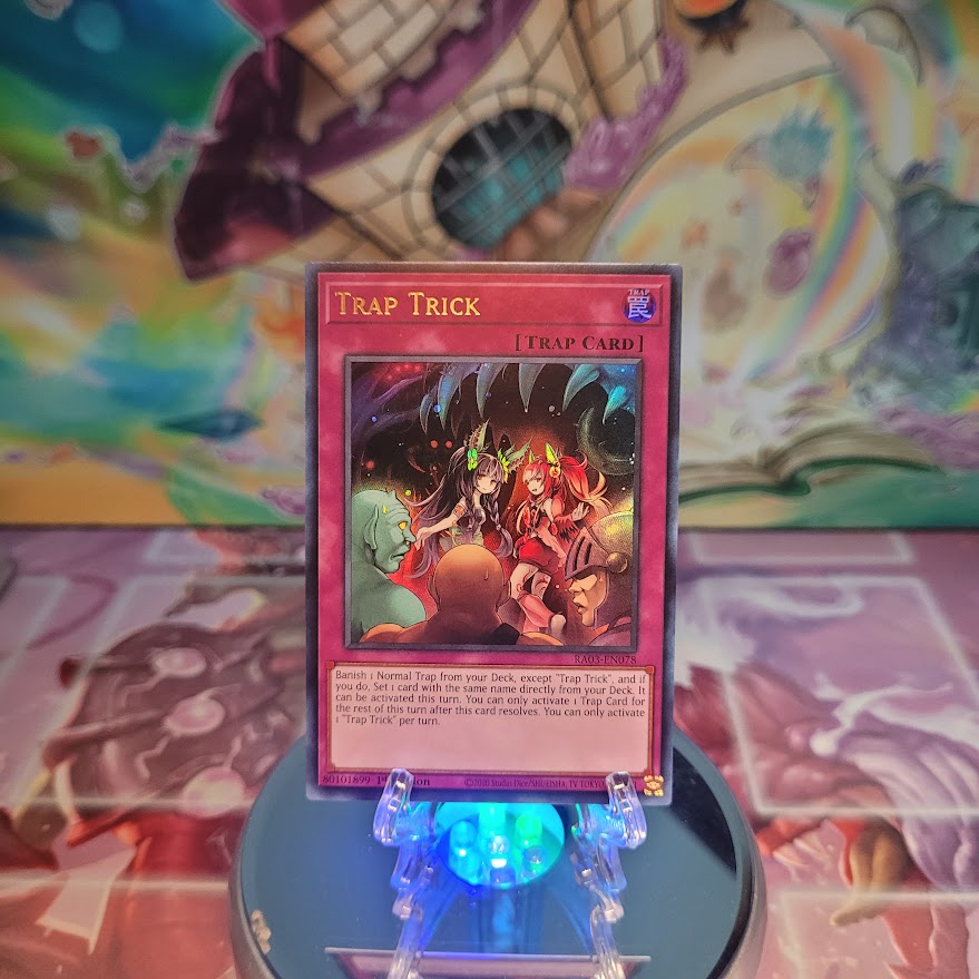 An Ultra Rare "Trap Trick" card from the Yugioh Set: Quarter Century Bonanza (RA03).