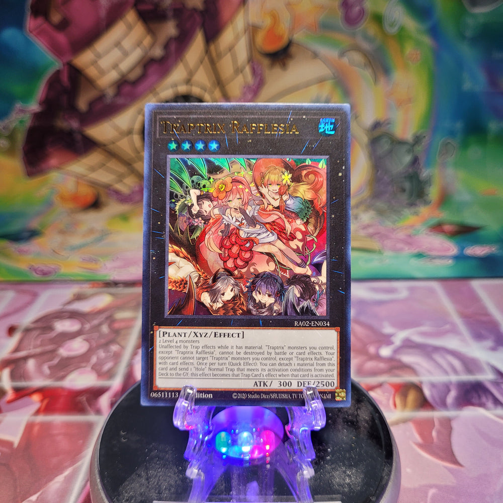 An Ultra Rare "Traptrix Rafflesia" card from the Yugioh Set: Rarity Collection 2 (RA02).