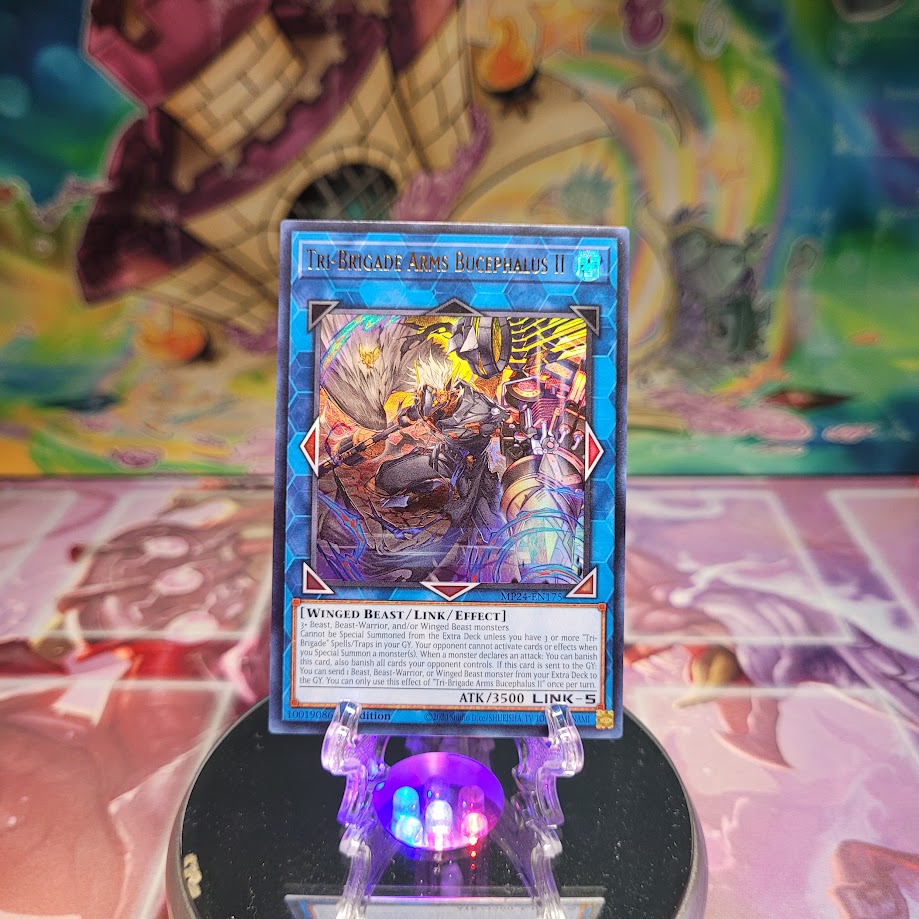 An Ultra Rare "Tri-Brigade Arms Bucephalus II" card from the Yugioh Set: 25th Anniversary Tin: Dueling Mirrors.