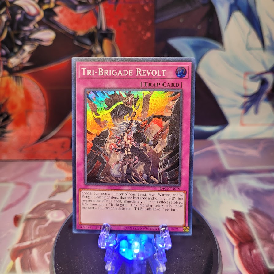 A Super Rare "Tri-Brigade Revolt" card from the Yugioh Set: Rarity Collection 1 (RA01).