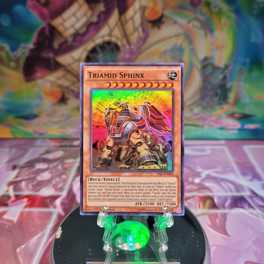 A Super Rare "Triamid Sphinx" card from the Yugioh Set: The Dark Illusion.