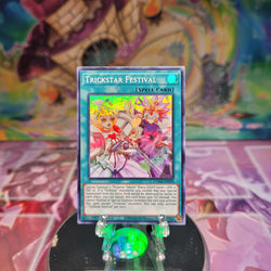 A Super Rare "Trickstar Festival" card from the Yugioh Set: Dawn of Majesty.